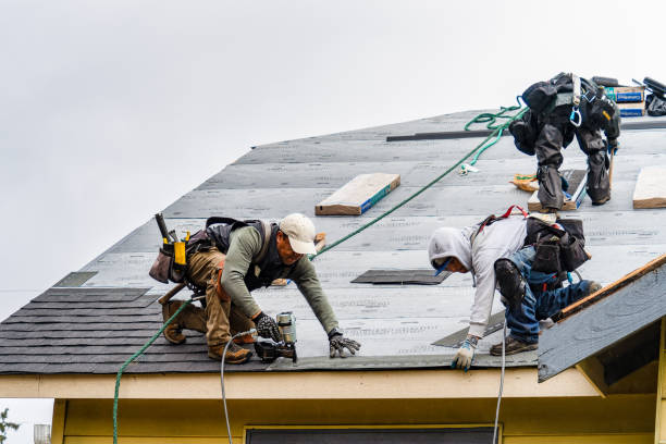 Professional Gutter Installation technician working in South Beach, FL